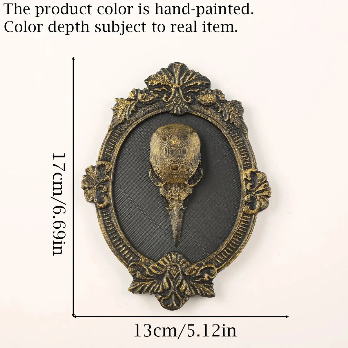 Accented plaque measurement diagram: Gothic Raven Skull Wall Plaque, featuring a raven skull relief surrounded by an elaborate oval frame.