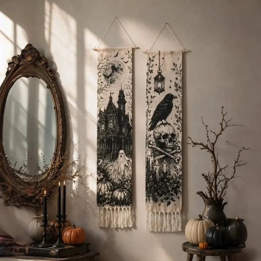 Halloween haunted house and crow skull tapestries hanging on wall near mirror and candles