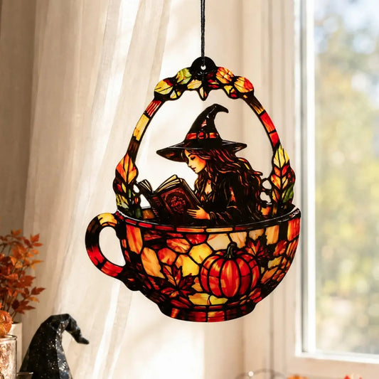 Halloween witch teacup suncatcher hanging in window with sheer curtains - stained glass style decor