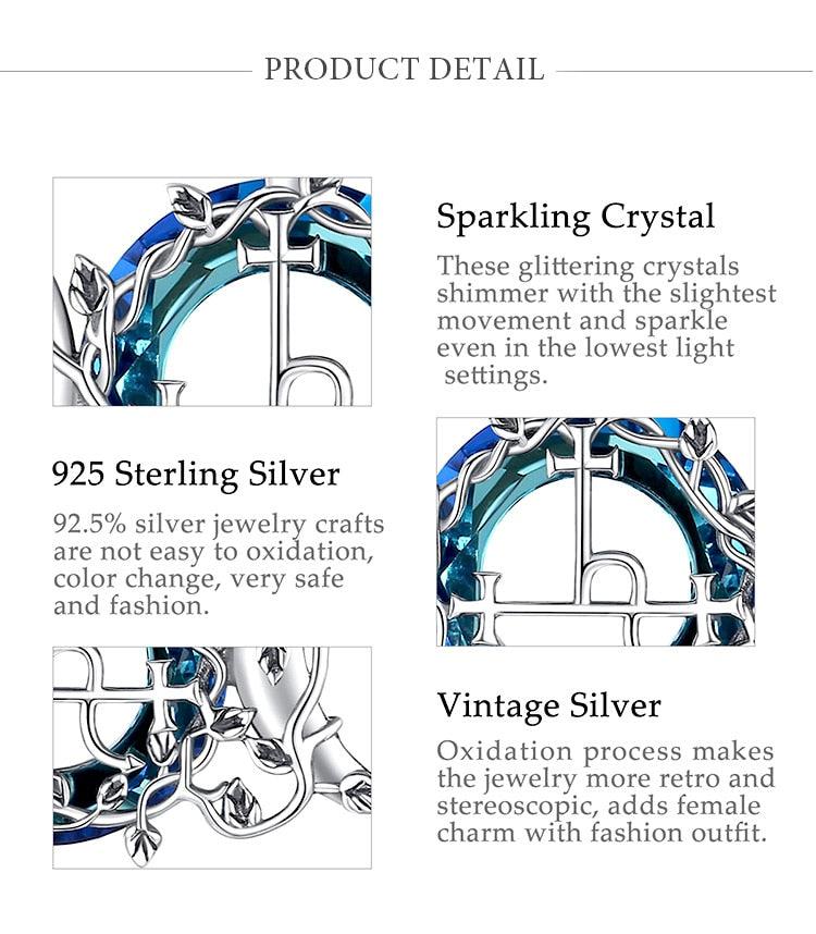 Close-up of a sparkling crystal 925 sterling silver Lilith Moon pendant with vintage silver details.