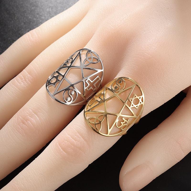 Stainless steel pentagram rings in silver and gold, featuring intricate Pagan and Wiccan symbols.
