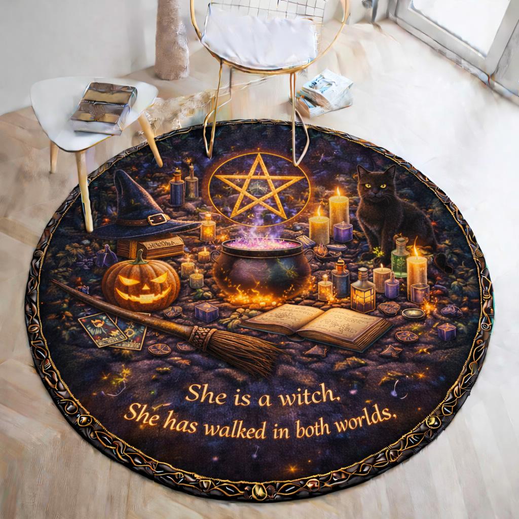 Wiccan Pentacle Pumpkin Cauldron Gothic Round Rug with black cat, broom, and witch hat on dark flannel.