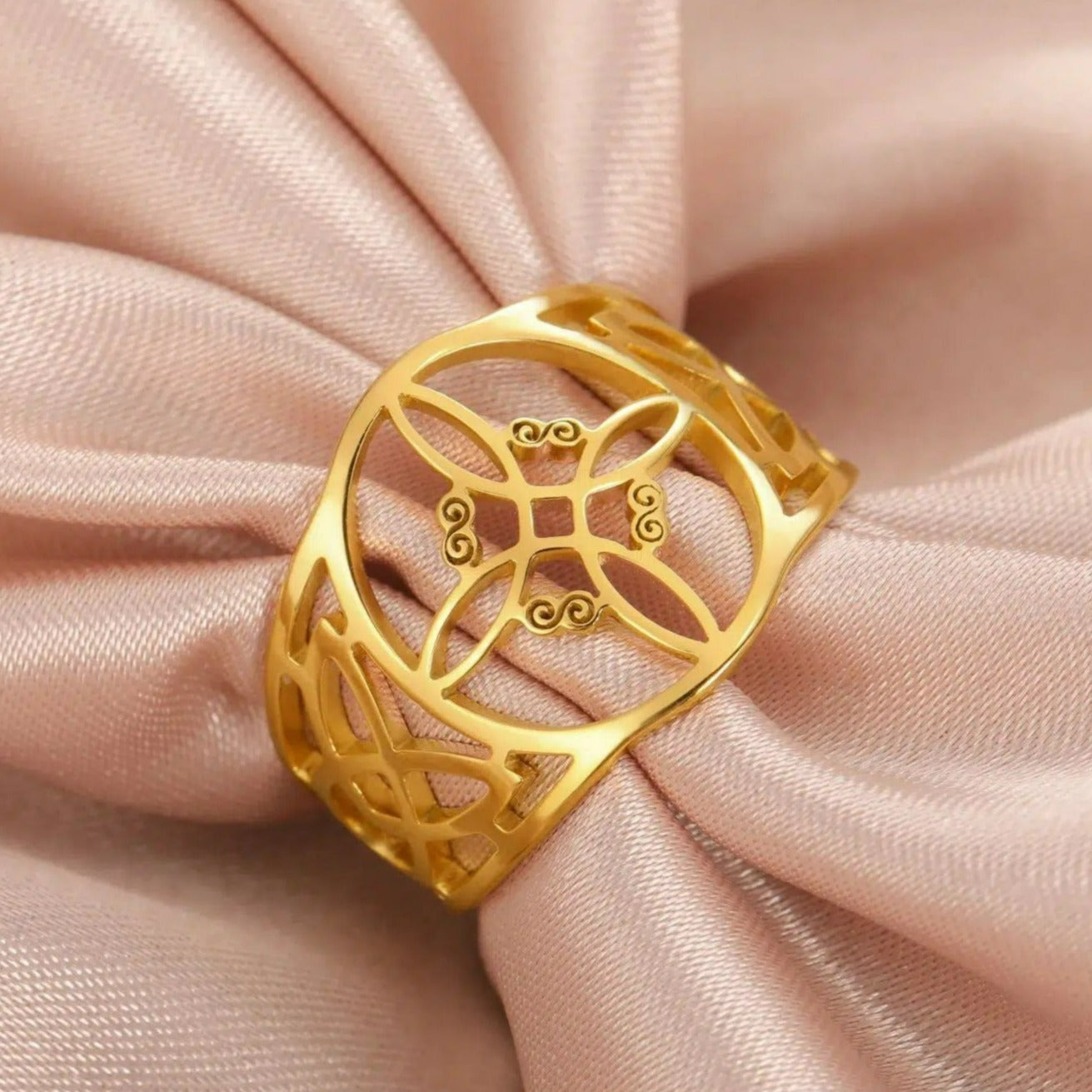 Enchanting gold stainless steel Witch Knot Ring with intricate Celtic knotwork, perfect for pagan protection jewelry.