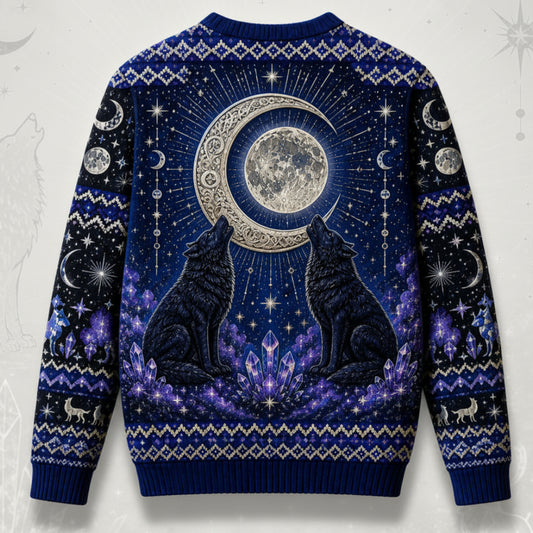 A navy blue crewneck sweater with a detailed celestial and wolf pattern, shown from the back. The design features two black howls facing a large silver crescent moon and full moon, surrounded by stars, crystals, and additional wolf motifs on the sleeves.