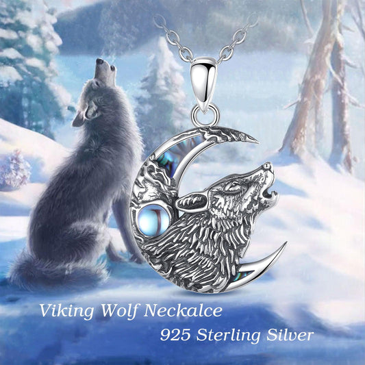Sterling silver moonstone wolf howling on a crescent moon necklace, 29.3mm x 20.6mm, high polish finish.