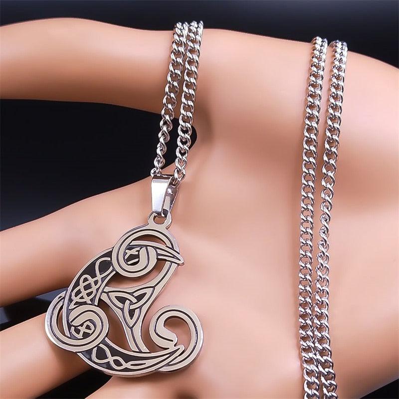 Silver Triskele Celtic Knot Necklace with intricate design, perfect for mystical fashion and Wiccan rituals.