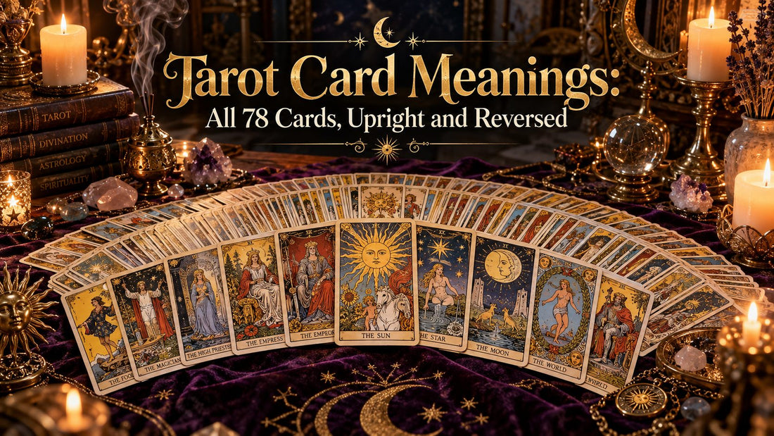 Tarot card meanings banner with a full deck of 78 tarot cards fanned out on a candlelit purple altar cloth