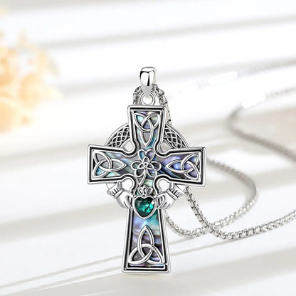 Irish Celtic cross Claddagh pendant detail – natural abalone green CZ spiritual unisex necklace