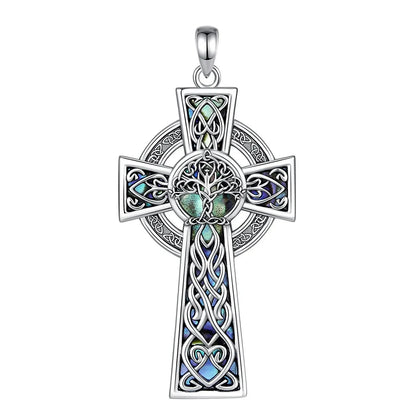 Close view of cross pendant with iridescent accents