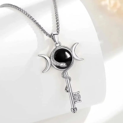 Hecate key necklace – serpent and triple moon symbolism detail