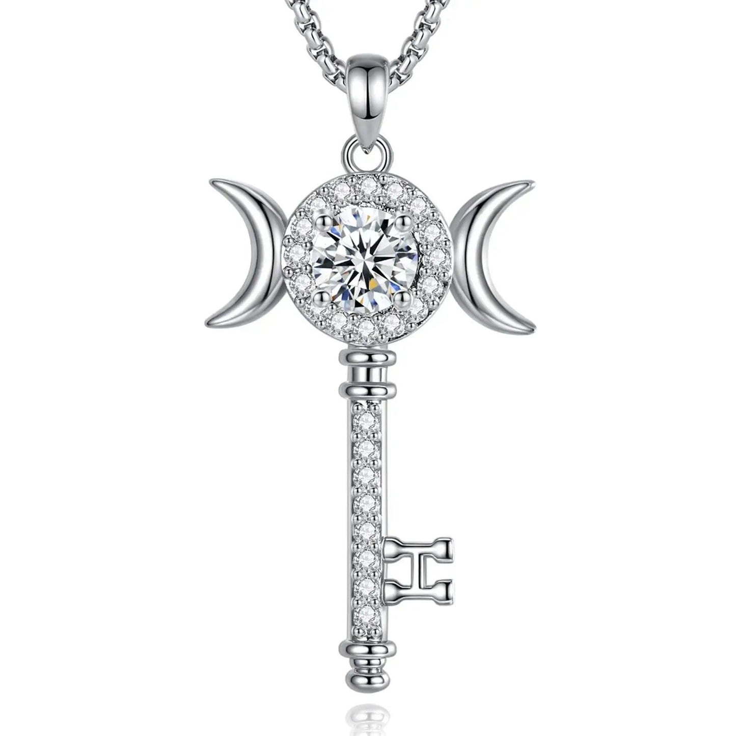 Sterling silver Hecate key necklace with a triple moon design and brilliant moissanite stones.