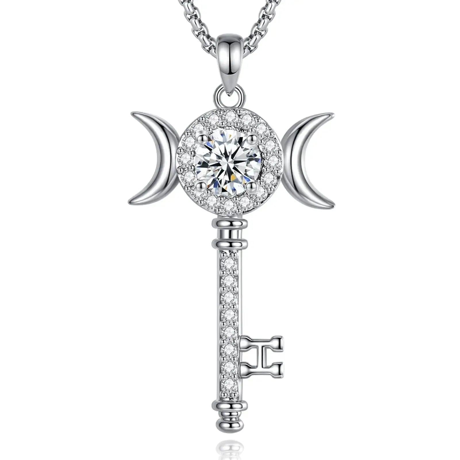 Sterling silver Hecate key necklace with a triple moon design and brilliant moissanite stones.