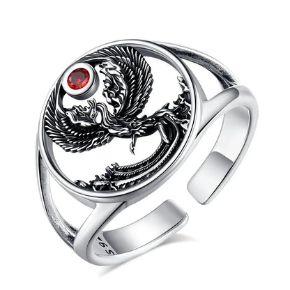 925 sterling silver adjustable phoenix ring with a vibrant red crystal, featuring an intricate cutout design.