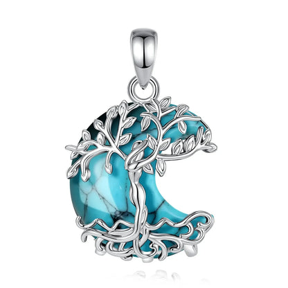 Close-up of silver Tree of Life crescent moon pendant with turquoise stone, chain detached