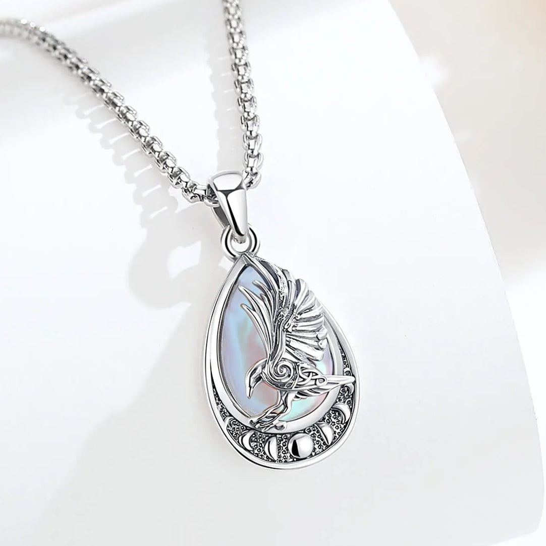 Moonstone crow pendant necklace with Elder Futhark runes and moon phases – Norse Pagan spiritual jewellery