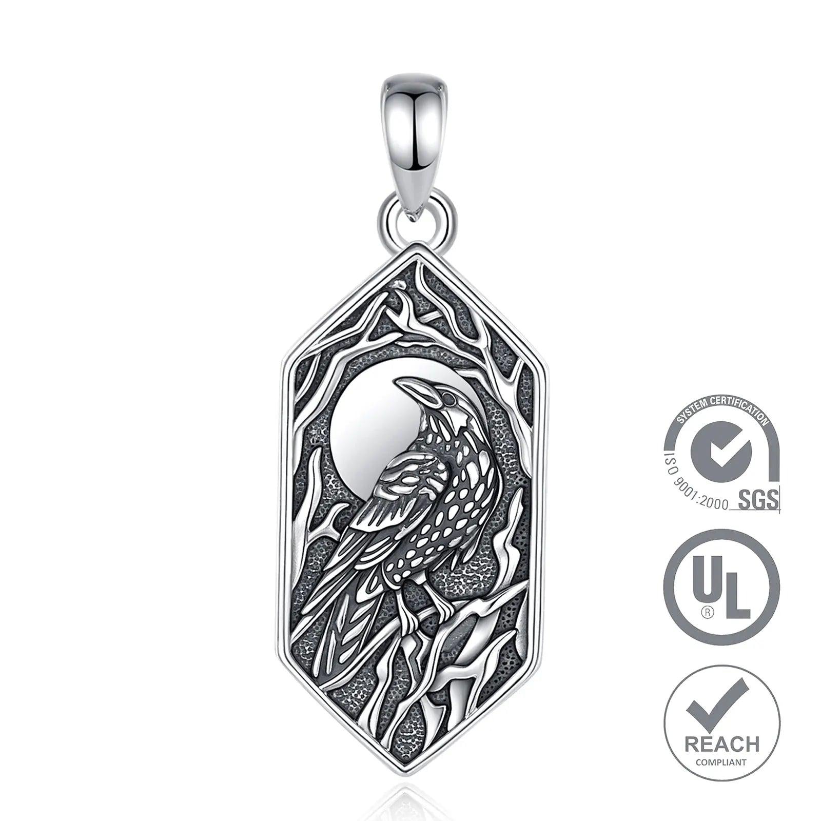Sterling silver Gothic raven pendant with a crescent moon and tree branches in a hexagonal frame.