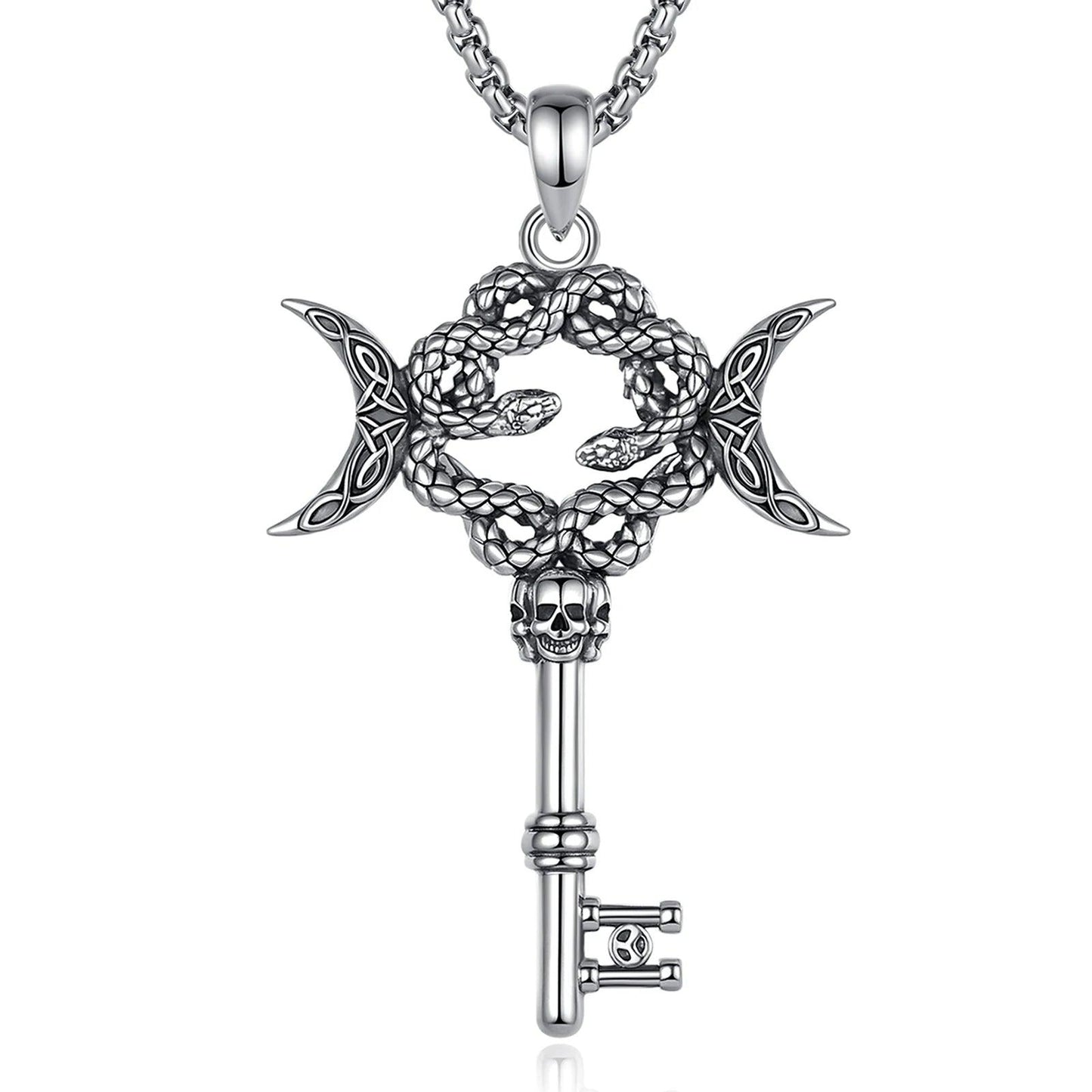 Sterling silver Hecate triple moon snake key necklace with skull detail on a chain.