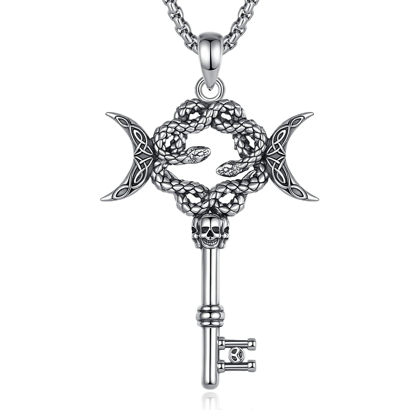 Sterling silver Hecate triple moon snake key necklace with skull detail on a chain.