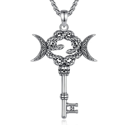 Sterling silver Hecate triple moon snake key necklace with skull detail on a chain.