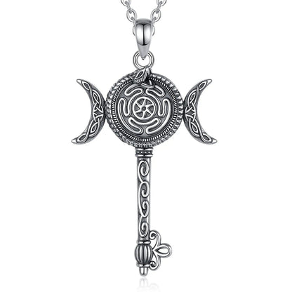 Sterling silver Hecate Wheel key necklace with snake and triple moon design.