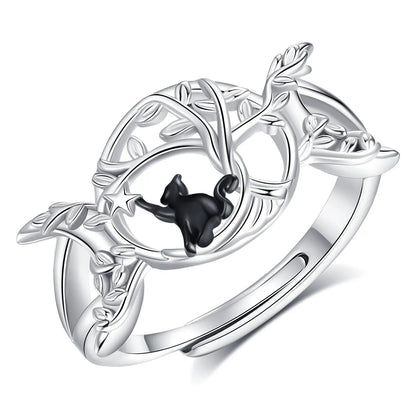 Sterling silver Triple Moon ring with a black cat, star, and leaf details.