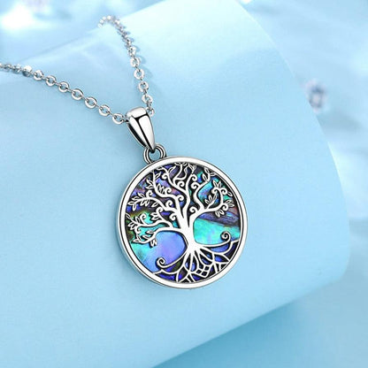 Sterling silver Abalone Shell Tree of Life necklace with iridescent blue-green pagan jewelry pendant.