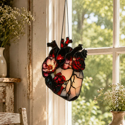 Vintage botanical heart window hanging shown backlit