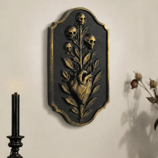 Heart skull wall plaque – vine and scroll carved detail close-up