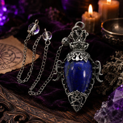 Lapis chain 1 water drop crystal pendulum on a Pagan ritual altar
