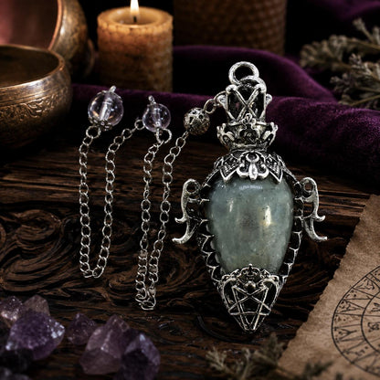 Labradorite chain 1 water drop crystal pendulum on a Pagan ritual altar