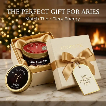 Aries Candle gift box with gold ribbon and gift tag by a fireplace - The Perfect Gift for Aries, Match Their Fiery Energy