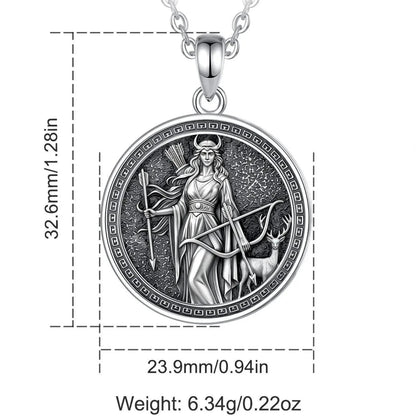 Sterling silver Artemis pendant worn over a dark neckline