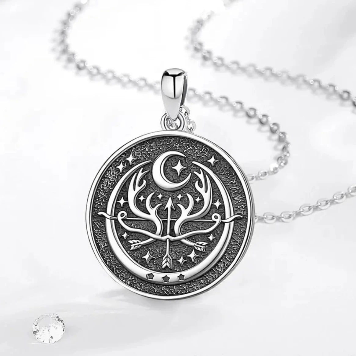 Round vintage goddess pendant shown flat