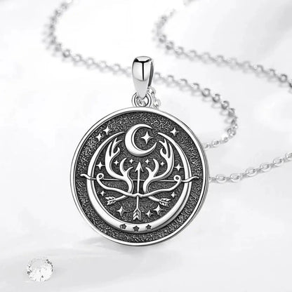Round vintage goddess pendant shown flat