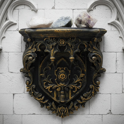Shield wall shelf – heraldic carved crest detail close-up