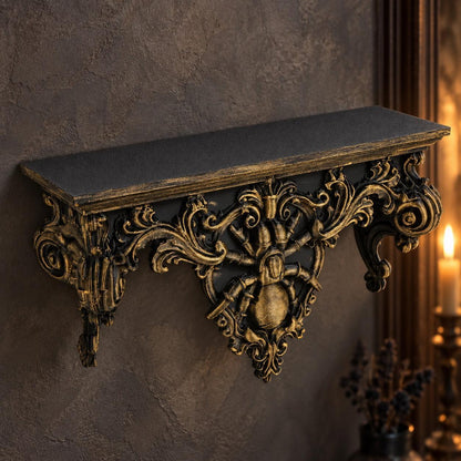 Top angled view of spider wall shelf showing gold scrollwork and flat ledge
