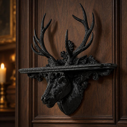 Black stag head shelf mounted against dark walnut paneling with soft side lighting