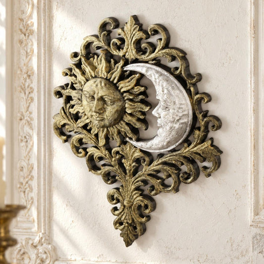 Gold sun and silver crescent moon baroque wall decor against an ivory vintage gothic wall