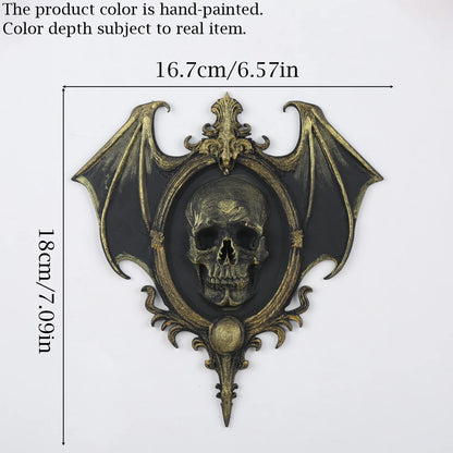 Bat wing skull plaque – witchy gothic home decor styled on wall