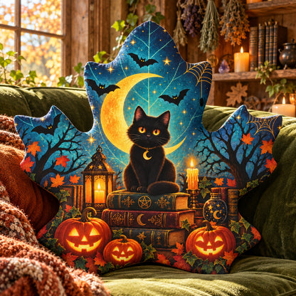 Black Cat Moon Maple Leaf Pillow in a witchy room