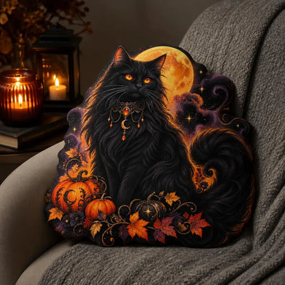 Styled room view: decorative plush pillow featuring black cat, moon and pumpkin artwork