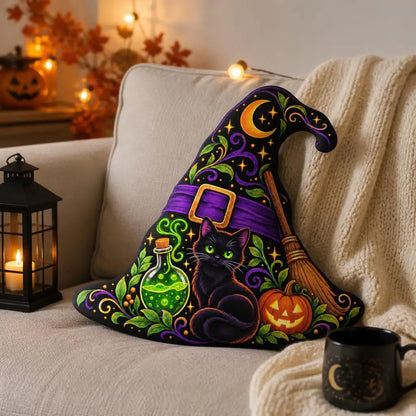 Styled room view: decorative plush pillow featuring black cat witch-hat artwork