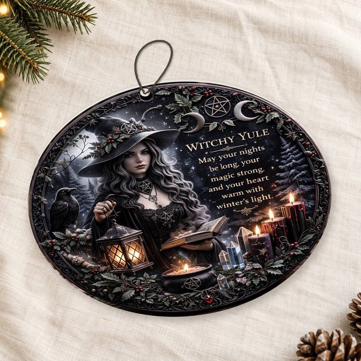 Brass Lantern & Cream Blessing Dark Witch Ceramic Ornament – Gothic Christmas Tree Decor — thin double-sided ceramic ornament, oblique overhead flat-lay view on linen.