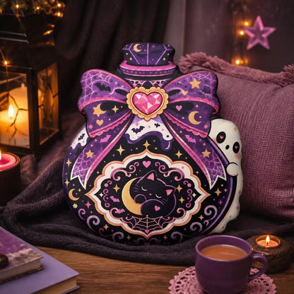 Styled room view: decorative plush pillow featuring ornate potion bottle with cat, ghost and bow artwork