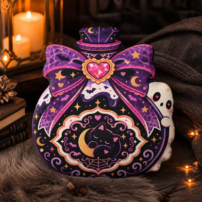 Alternate styled room view: decorative plush pillow featuring ornate potion bottle with cat, ghost and bow artwork