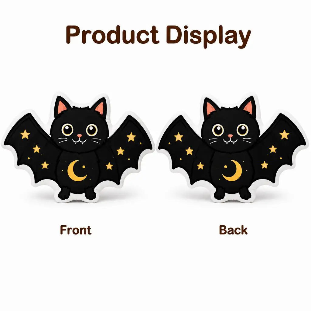 Front and back views: decorative plush pillow featuring bat-winged cat with crescent moon and stars