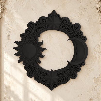Black celestial sun and moon ornate wall decor on a bright vintage gothic wall, front view.