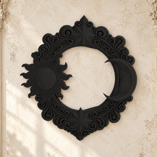 Black celestial sun and moon ornate wall decor on a bright vintage gothic wall, front view.