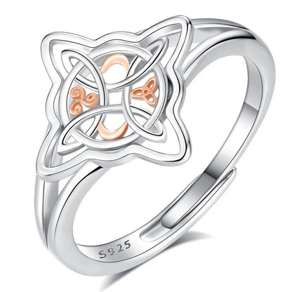 Sterling silver Celtic Knot Witchcraft Ring with rose gold accents and an adjustable band.