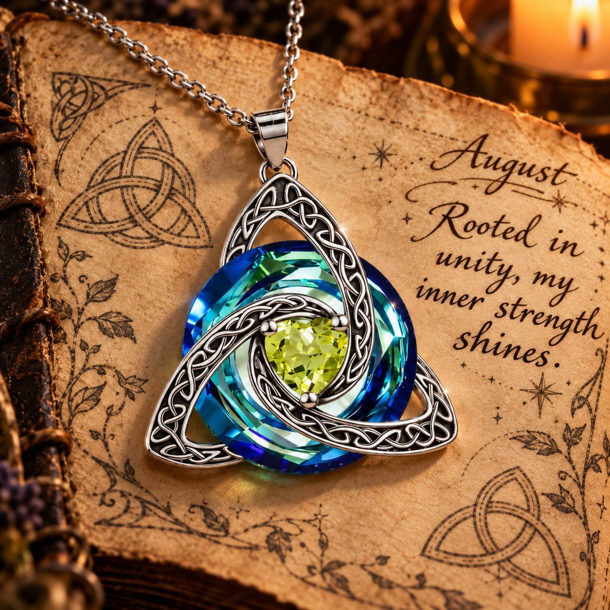 August Celtic Trinity Knot Birthstone Necklace on parchment — Rooted in unity, my inner strength shines.